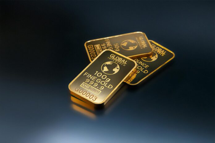 best gold bars to buy three gold bars against dark background best gold bars to buy