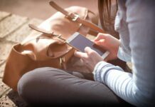 10 Simple Ways to Make Money from Your Phone person using android smartphone make money from your phone